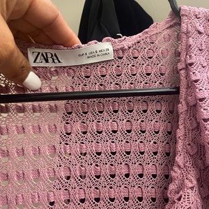 Beautiful Lilac flowing dress with button up closure.